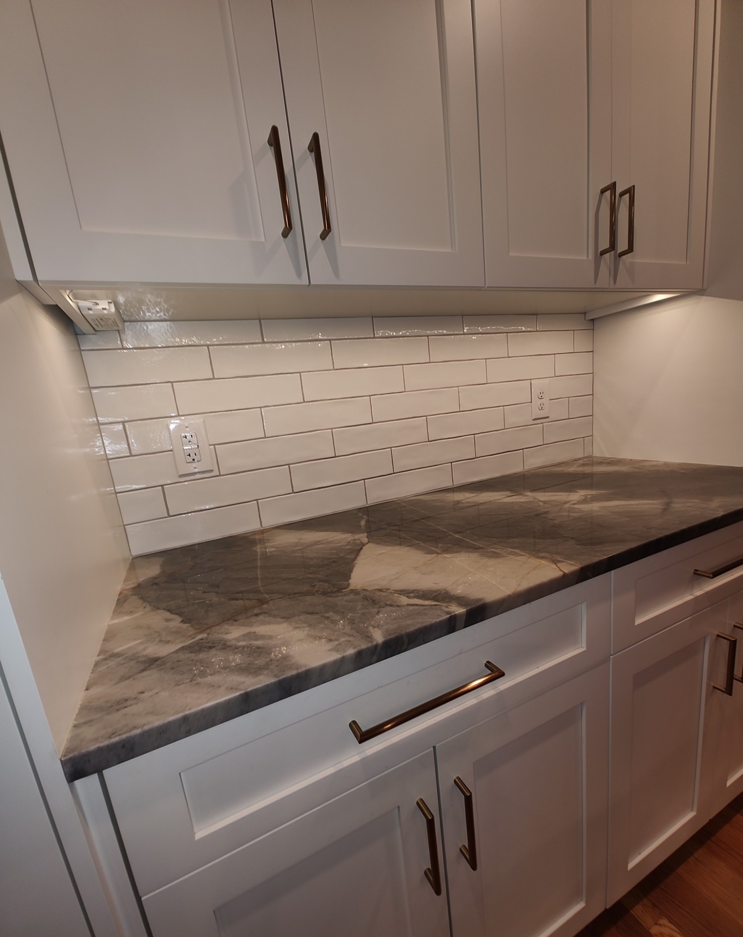 Kitchen countertop and backsplash, second angle
