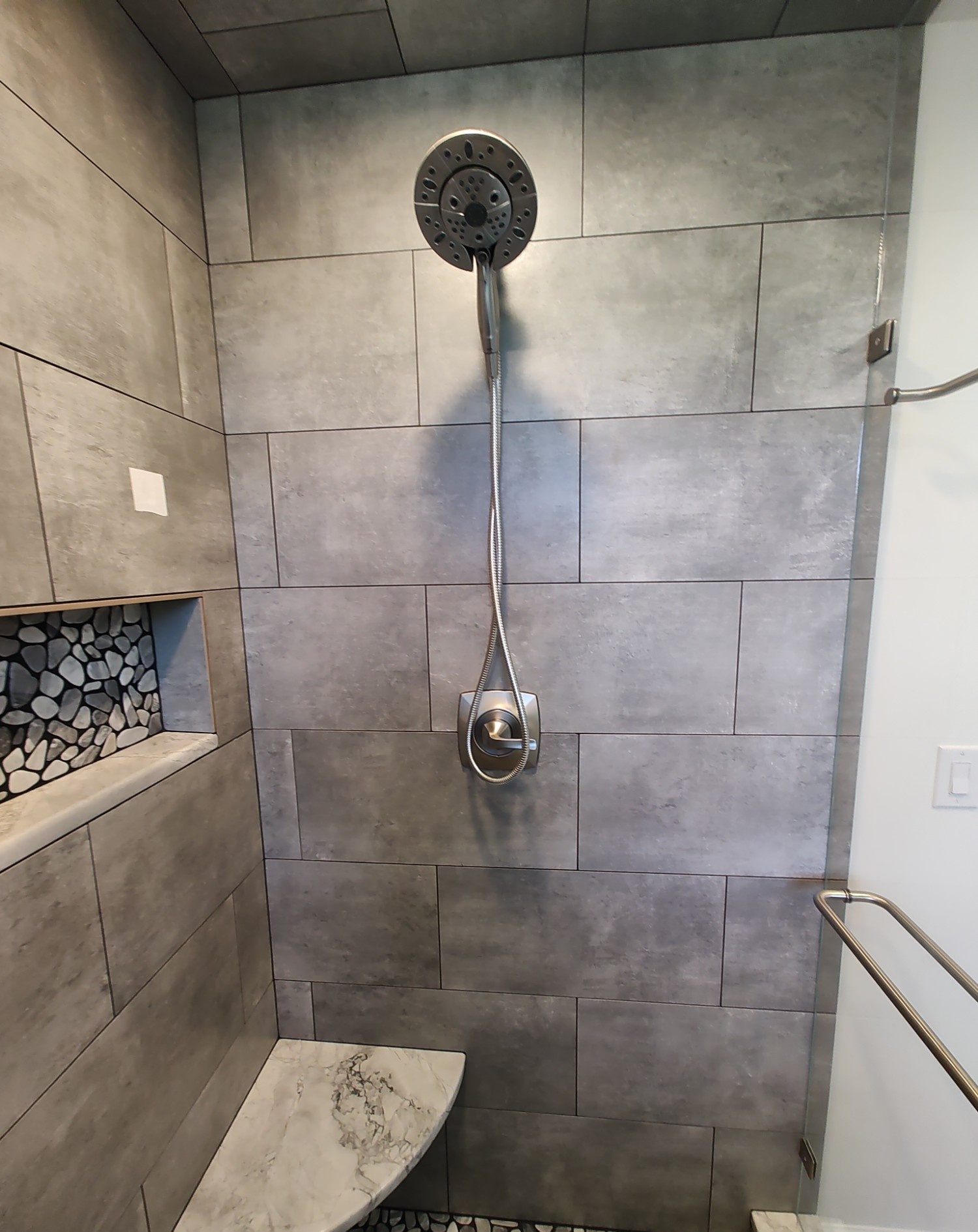 Close-up of a modern shower head installation